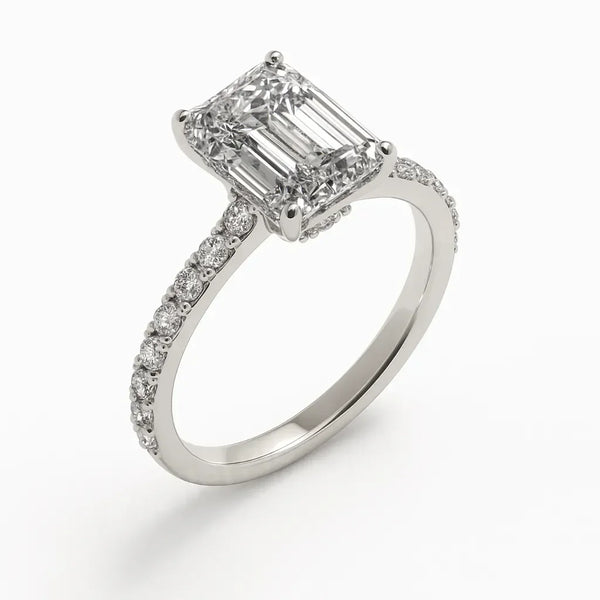 White gold engagement ring with emerald-cut diamond and pavé band, Brisbane Jeweller