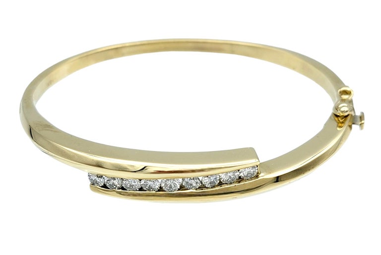 Solid 9ct gold handmade diamond set hinged bangle tdw 16 x 2mm F colour vvs rnd diamonds = .60pt  25.5 grams